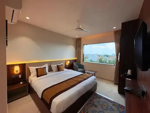 Standard Room at Basera Hotel with a city-view window